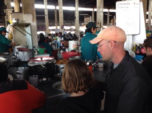 My husband and daughter enjoying a $1.33 lunch special, including drink, at the mercado.
