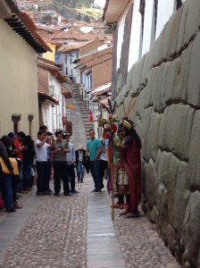 This man dresses like an Incan Emperor and stands in this alley every day.